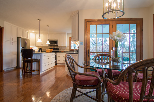 Traditional Raised Panel Kitchen With Granite Countertops And