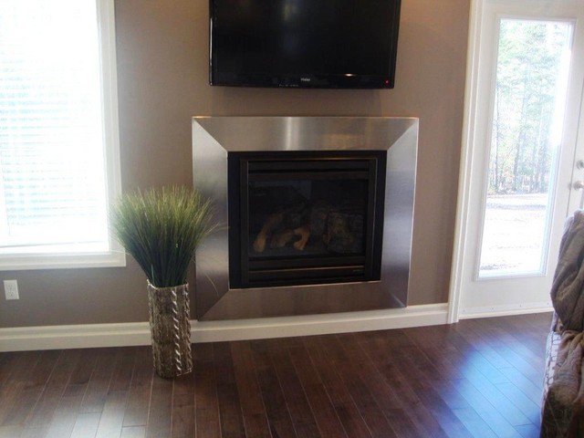 Stainless steel fireplace surround - Contemporary - Living Room - Ottawa - by Ridalco Stainless Steel