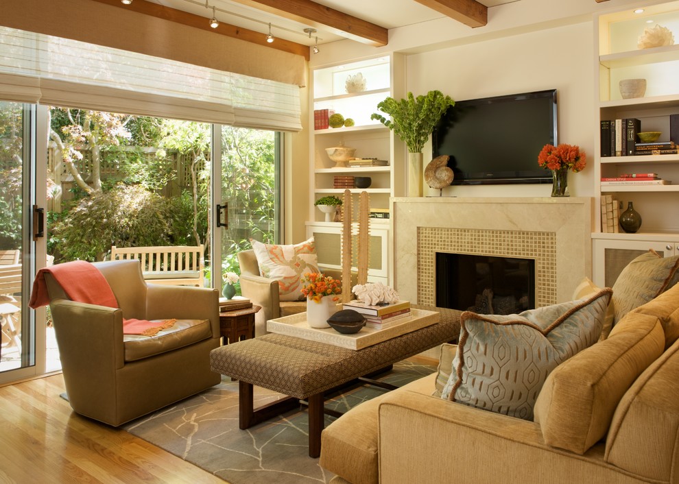 Inspiration for a contemporary living room in San Francisco with a tile fireplace surround.