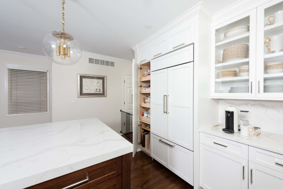 Inspiration for a small transitional l-shaped dark wood floor and brown floor eat-in kitchen remodel in Chicago with an undermount sink, shaker cabinets, white cabinets, quartz countertops, white backsplash, stone slab backsplash, white appliances, an island and white countertops