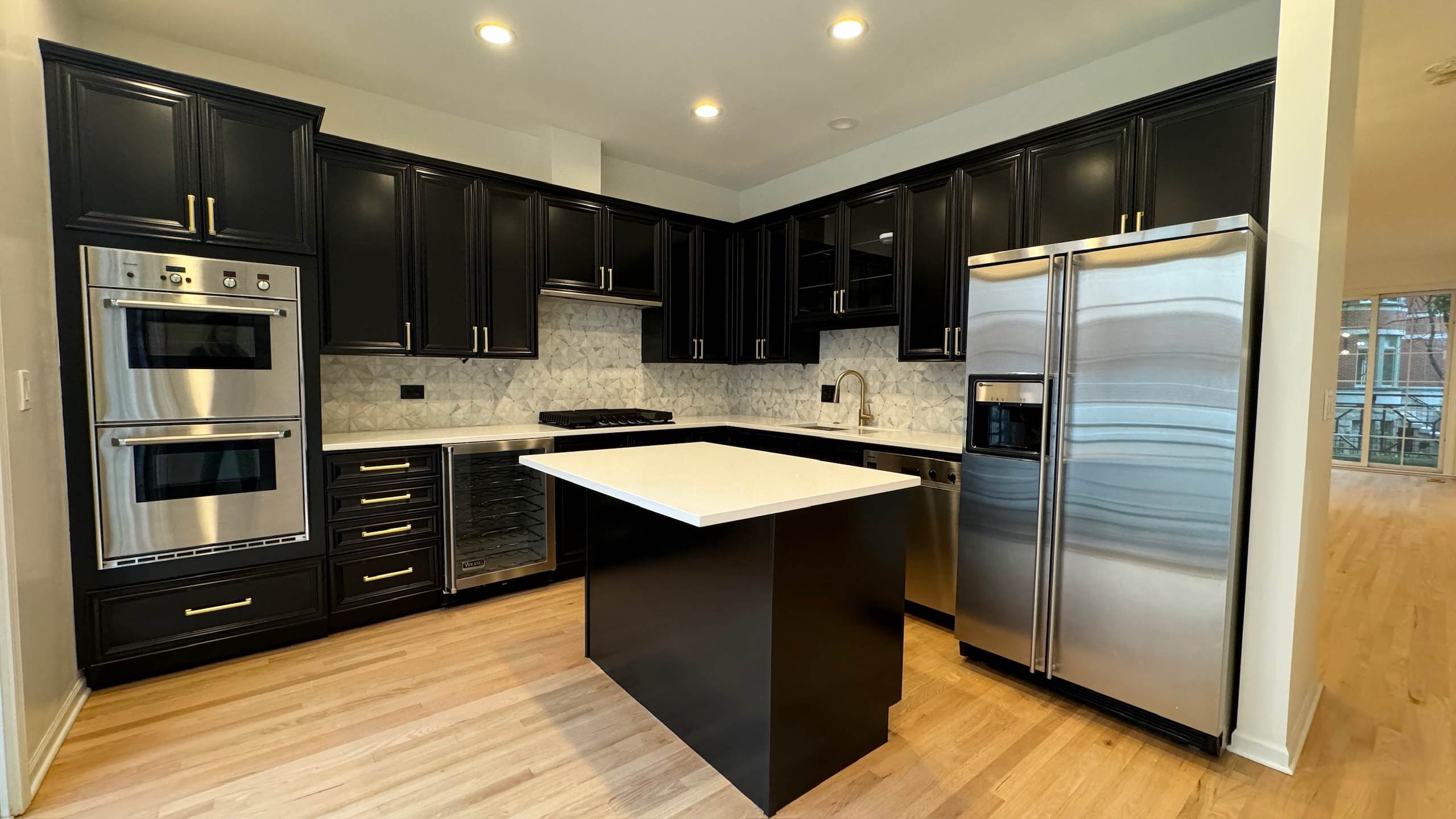 Modern Black Kitchen by Cabanilla Design Collective