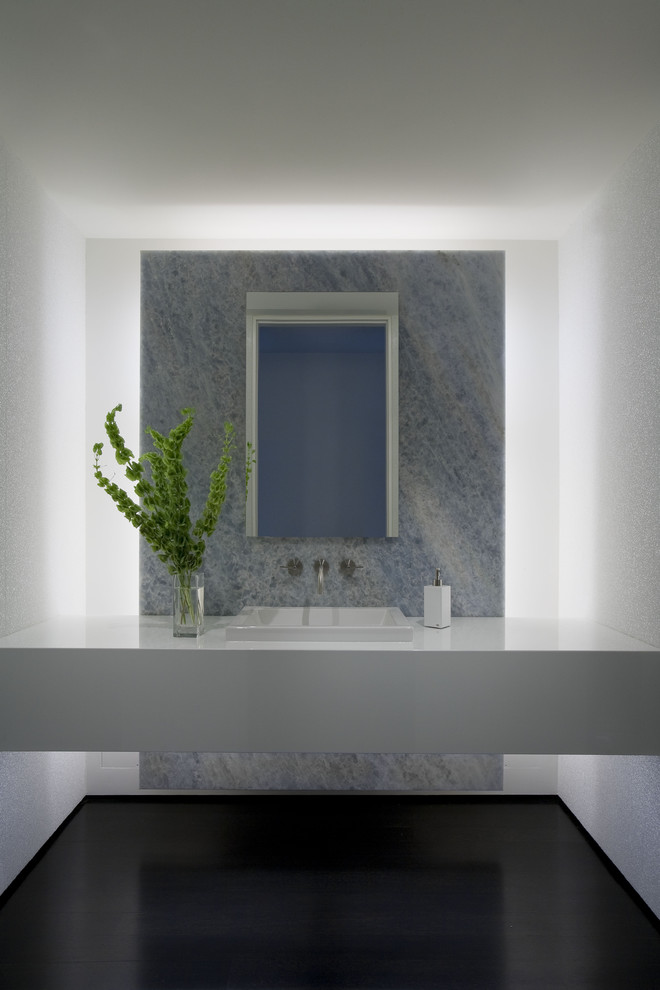 Design ideas for a contemporary bathroom in New York with a drop-in sink, flat-panel cabinets and white cabinets.