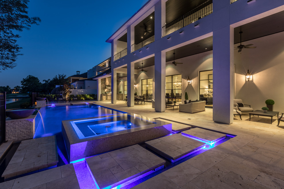Inspiration for a mid-sized transitional backyard concrete paver and rectangular lap hot tub remodel in Houston