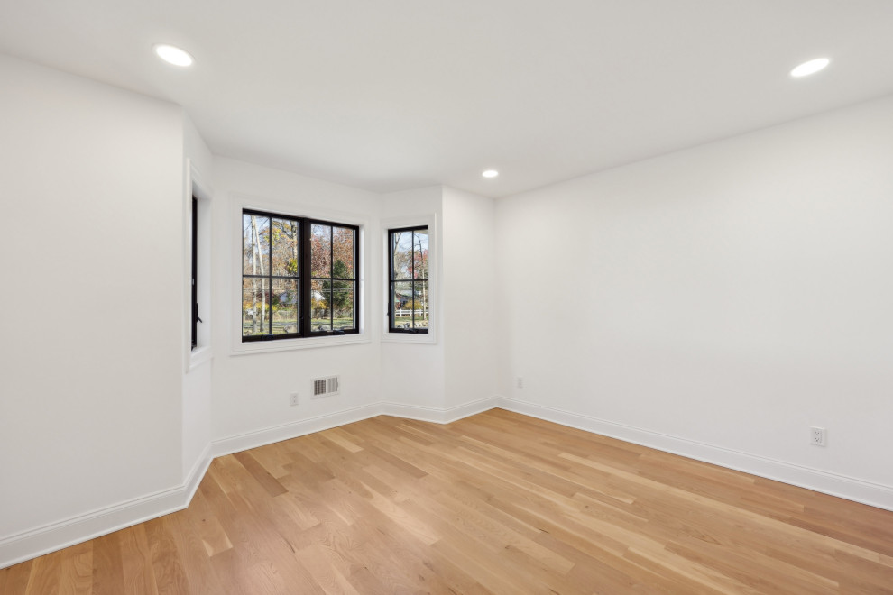 Bedroom With Black Frame Windows | Home Addition Wyckoff NJ