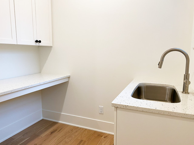 West Olive, MI Custom Home transitional-utility-room