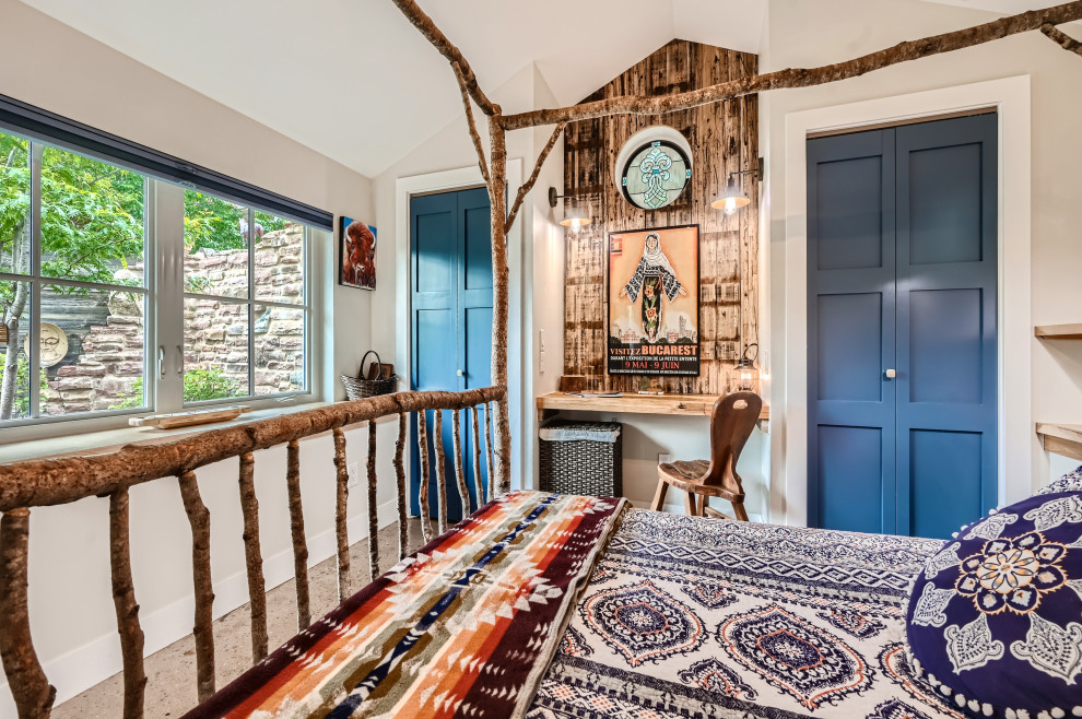 Bedroom - small rustic master vaulted ceiling bedroom idea in Denver