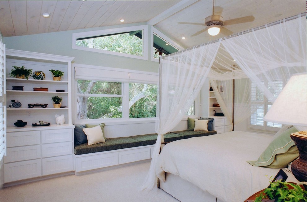 Design ideas for a tropical master bedroom in Hawaii with green walls and no fireplace.