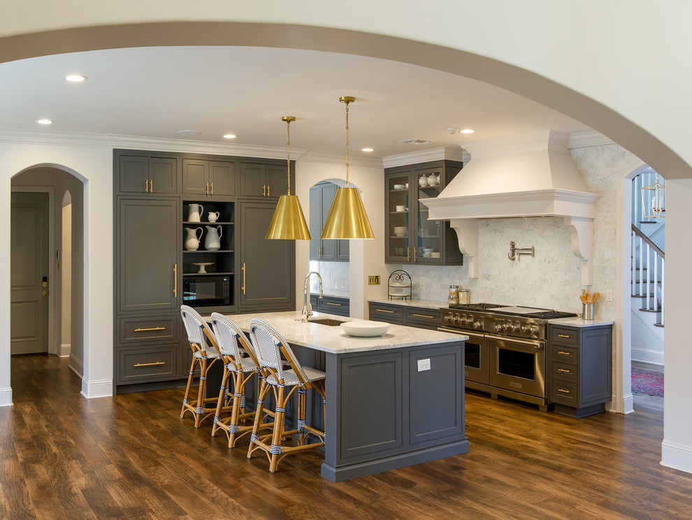 Kitchen pantry - transitional dark wood floor and brown floor kitchen pantry idea with beaded inset cabinets, gray cabinets, white backsplash, paneled appliances, an island and white countertops