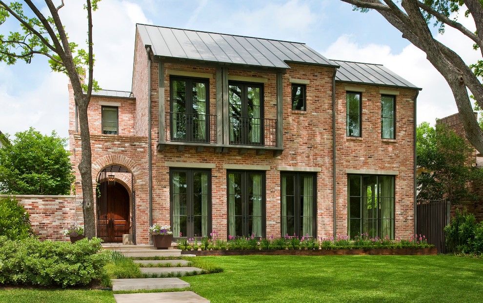 Transitional two-storey brick exterior in Dallas.