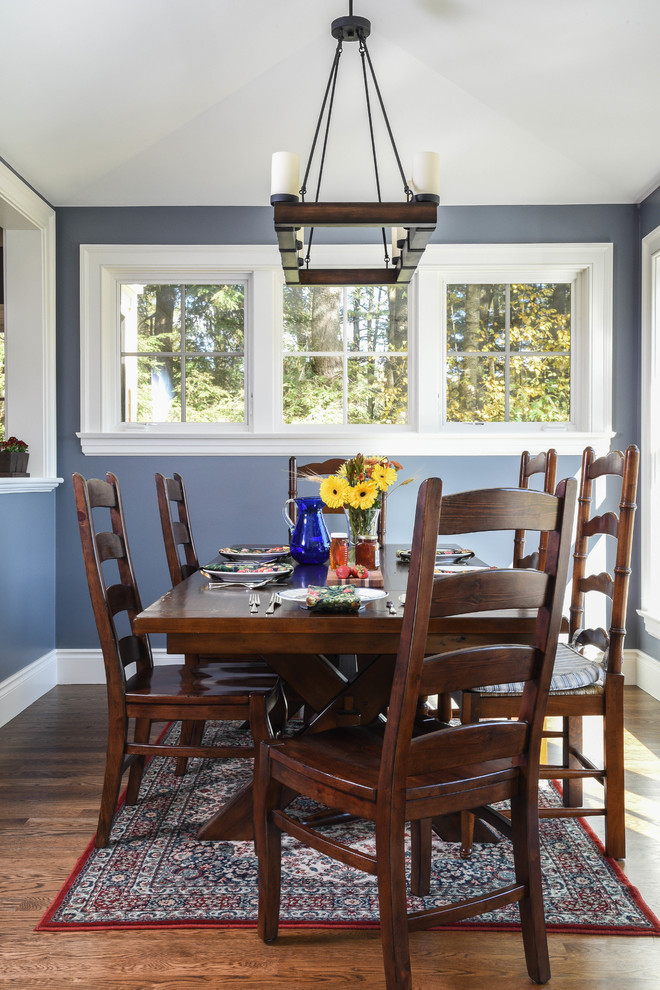 Inspiration for a small beach style separate dining room in Portland Maine with blue walls, dark hardwood floors and no fireplace.
