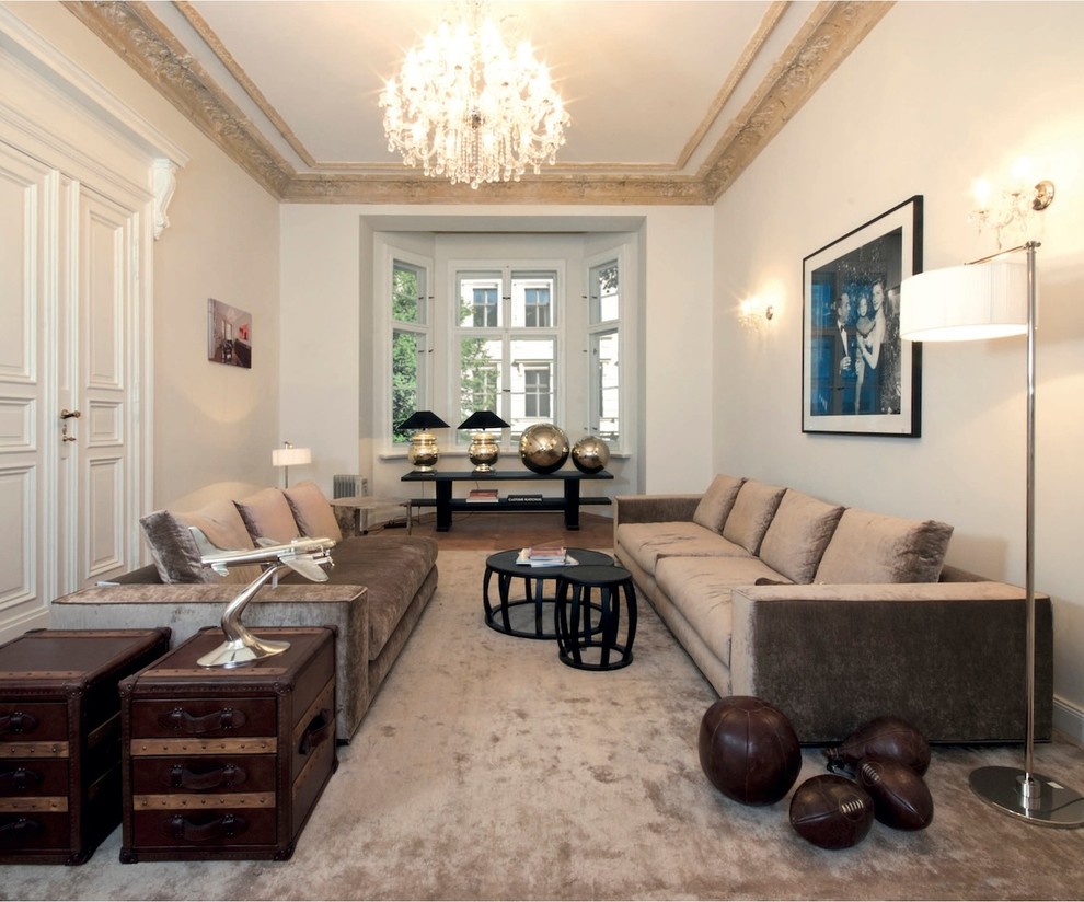 Large contemporary enclosed family room in Berlin with white walls, carpet and no fireplace.