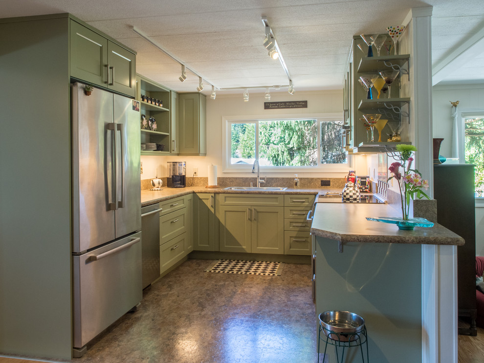 Example of a small transitional u-shaped vinyl floor and brown floor enclosed kitchen design in Seattle with a drop-in sink, recessed-panel cabinets, green cabinets, laminate countertops, brown backsplash, stainless steel appliances, no island and brown countertops