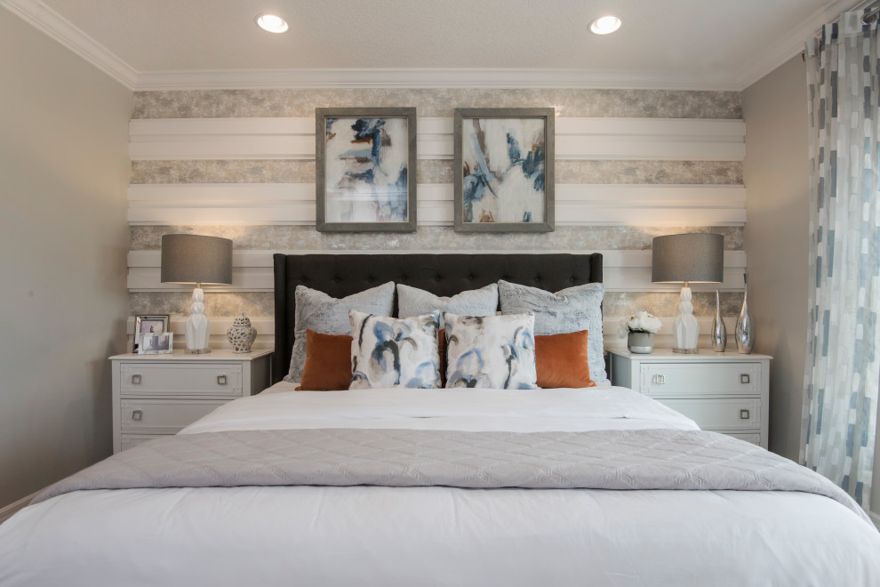 Mid-sized transitional bedroom in Orlando with white walls, beige floor and wallpaper.