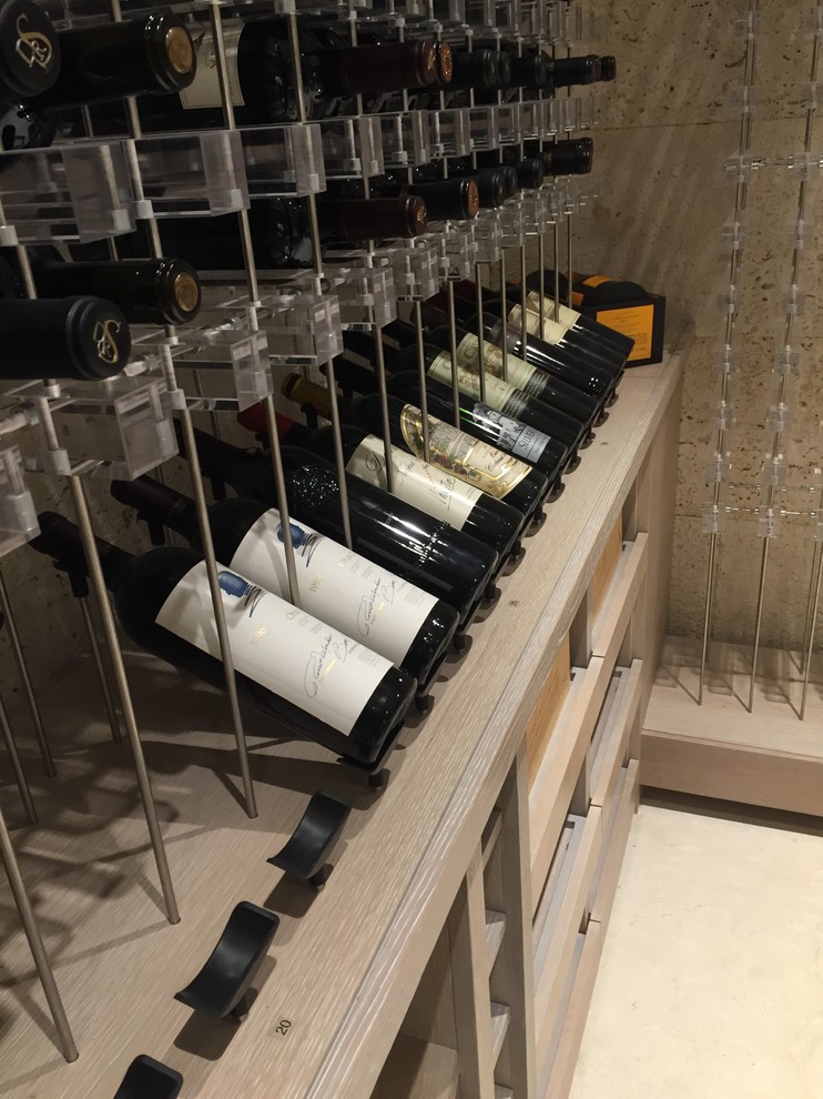 Inspiration for a contemporary wine cellar in San Diego with storage racks.