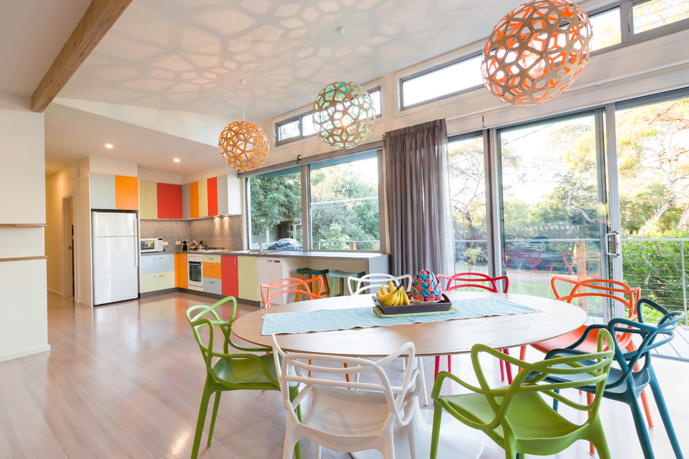 Photo of a large contemporary kitchen/dining combo in Melbourne.