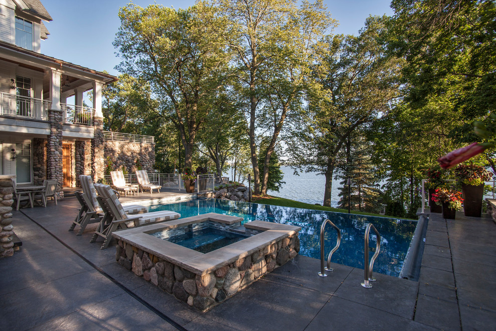 Example of a large mountain style pool design in Minneapolis
