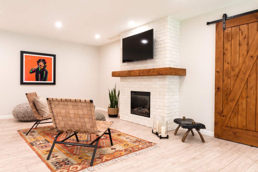 Example of a transitional home design design in Vancouver