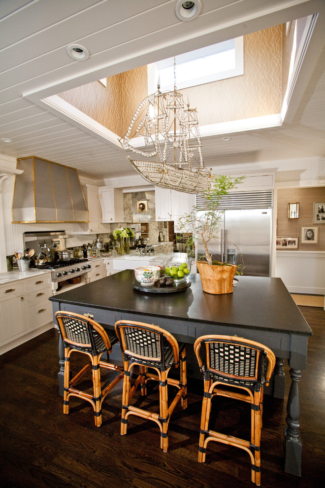 Eclectic kitchen in San Diego with stainless steel appliances and a farmhouse sink.