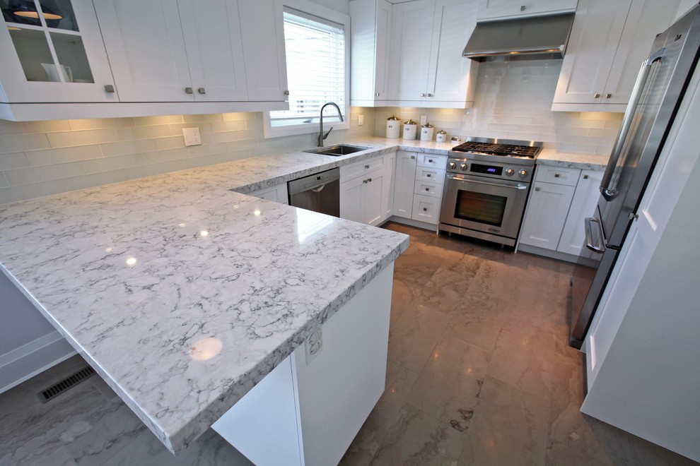 Example of a transitional kitchen design in Toronto