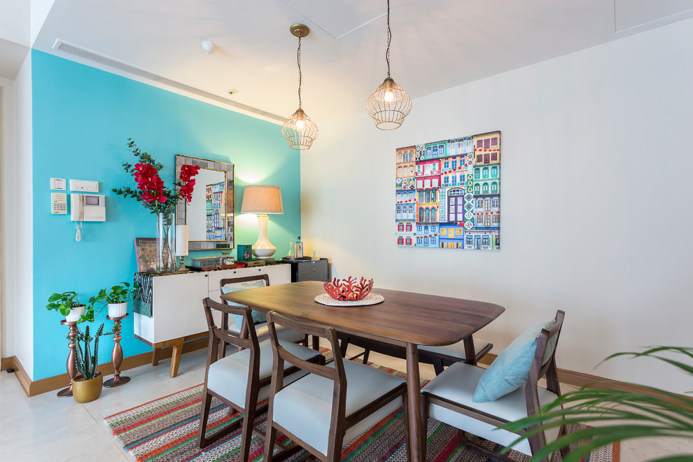 This is an example of an eclectic dining room in Singapore.