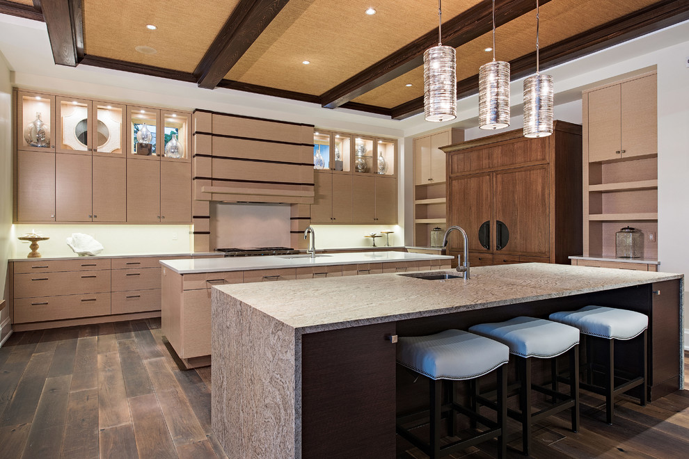 Expansive asian eat-in kitchen in Miami with an undermount sink, flat-panel cabinets, light wood cabinets, panelled appliances, medium hardwood floors and multiple islands.