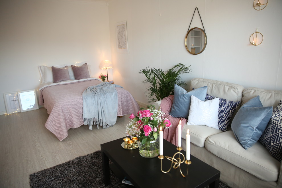 Foto på ett minimalistiskt vardagsrum