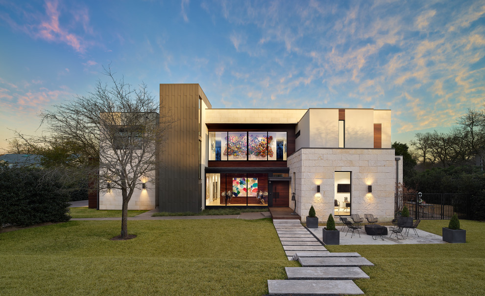 North Dallas - Inspiration for a large contemporary beige two-story stone flat roof remodel in Dallas with a metal roof