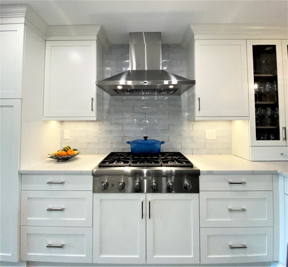 Example of a transitional kitchen design in New York