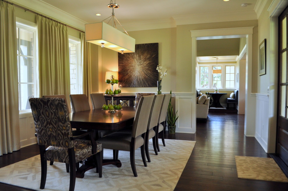 Design ideas for a large transitional separate dining room in Austin with beige walls and dark hardwood floors.