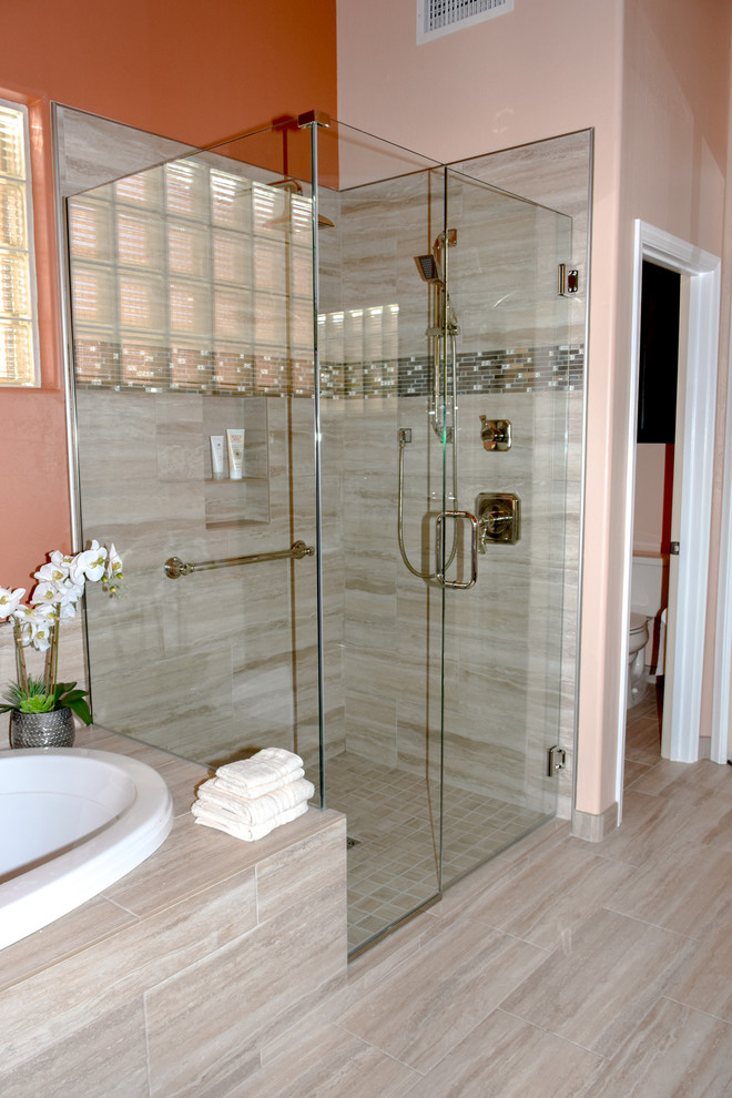 Mid-sized transitional master multicolored tile beige floor bathroom photo in Phoenix with a two-piece toilet, multicolored walls, a drop-in sink and a hinged shower door