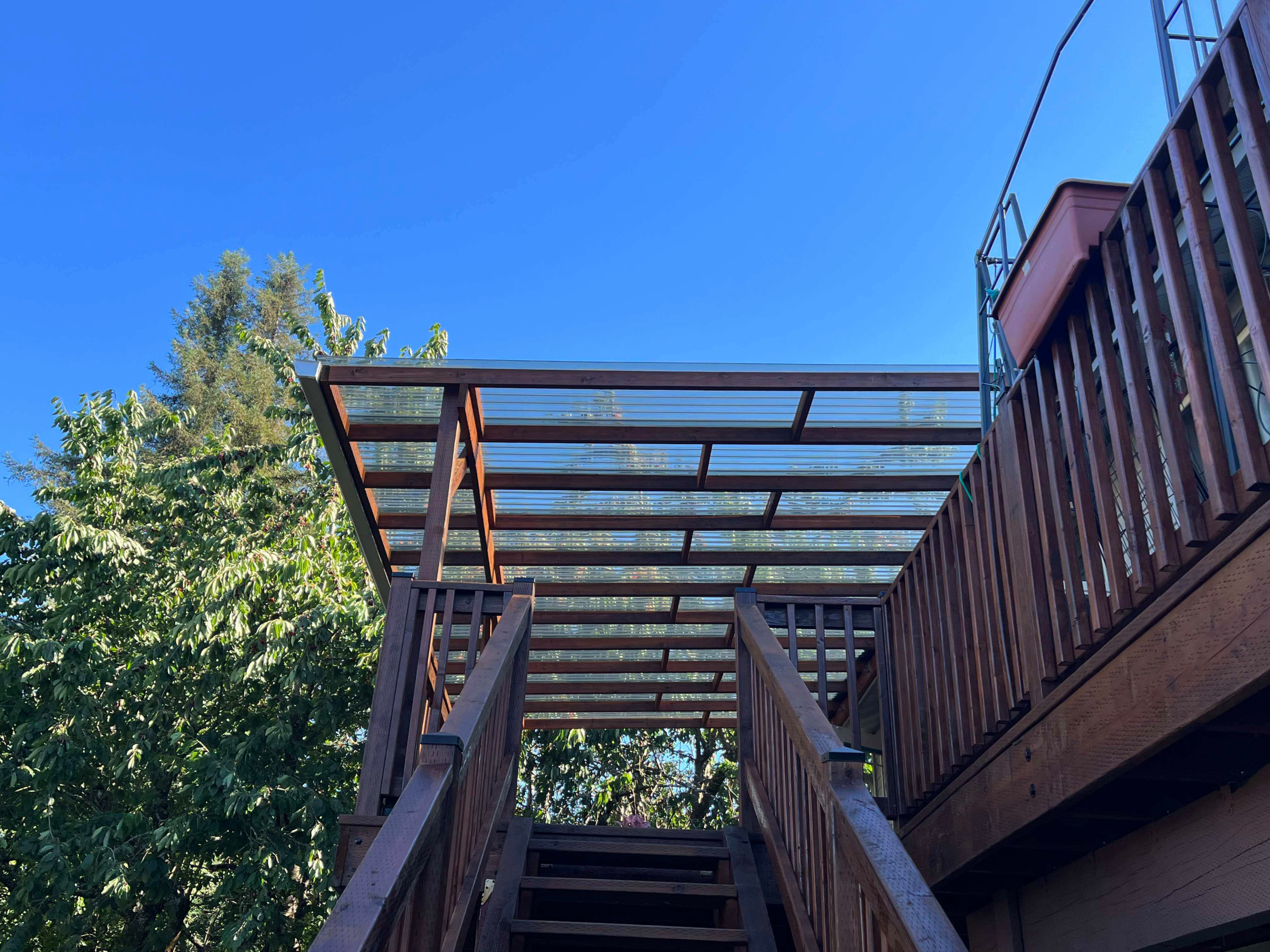 Deck Reconstruction, Stain & Roof Build