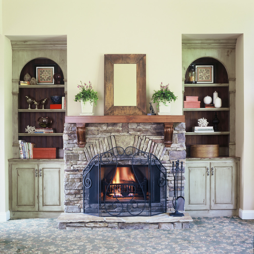 Inspiration for a rustic family room remodel in Atlanta with a stone fireplace