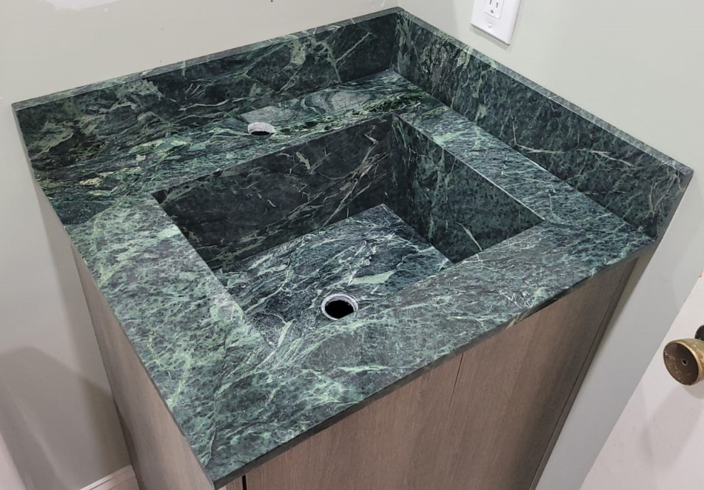 Design ideas for a small master bathroom in New York with flat-panel cabinets, an integrated sink, marble benchtops, green benchtops and a freestanding vanity.