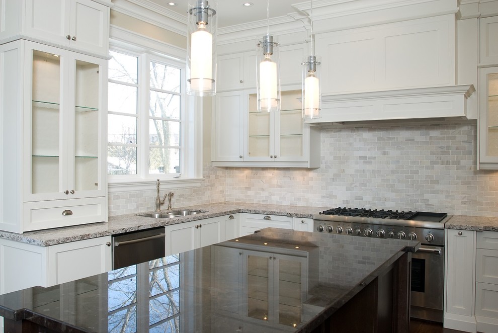 Example of a transitional kitchen design in Toronto