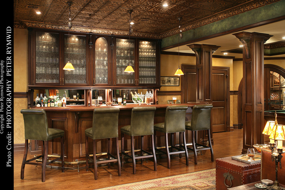 Design ideas for a traditional home bar in New York.