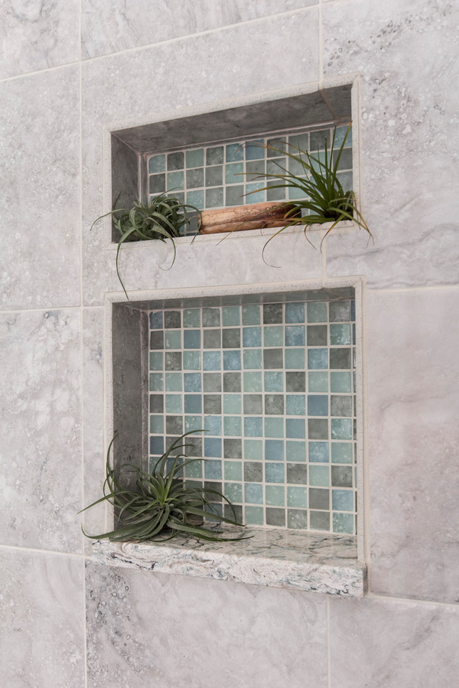 Inspiration for a mid-sized transitional master gray tile and porcelain tile porcelain tile and gray floor alcove shower remodel in DC Metro with recessed-panel cabinets, dark wood cabinets, a two-piece toilet, blue walls, an undermount sink, quartz countertops and a hinged shower door