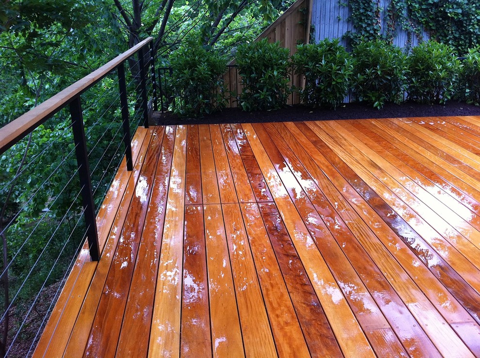 Photo of a mid-sized modern backyard deck in Austin.