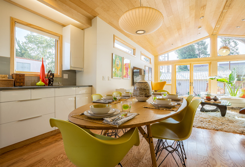 This is an example of a contemporary open plan dining in San Francisco.