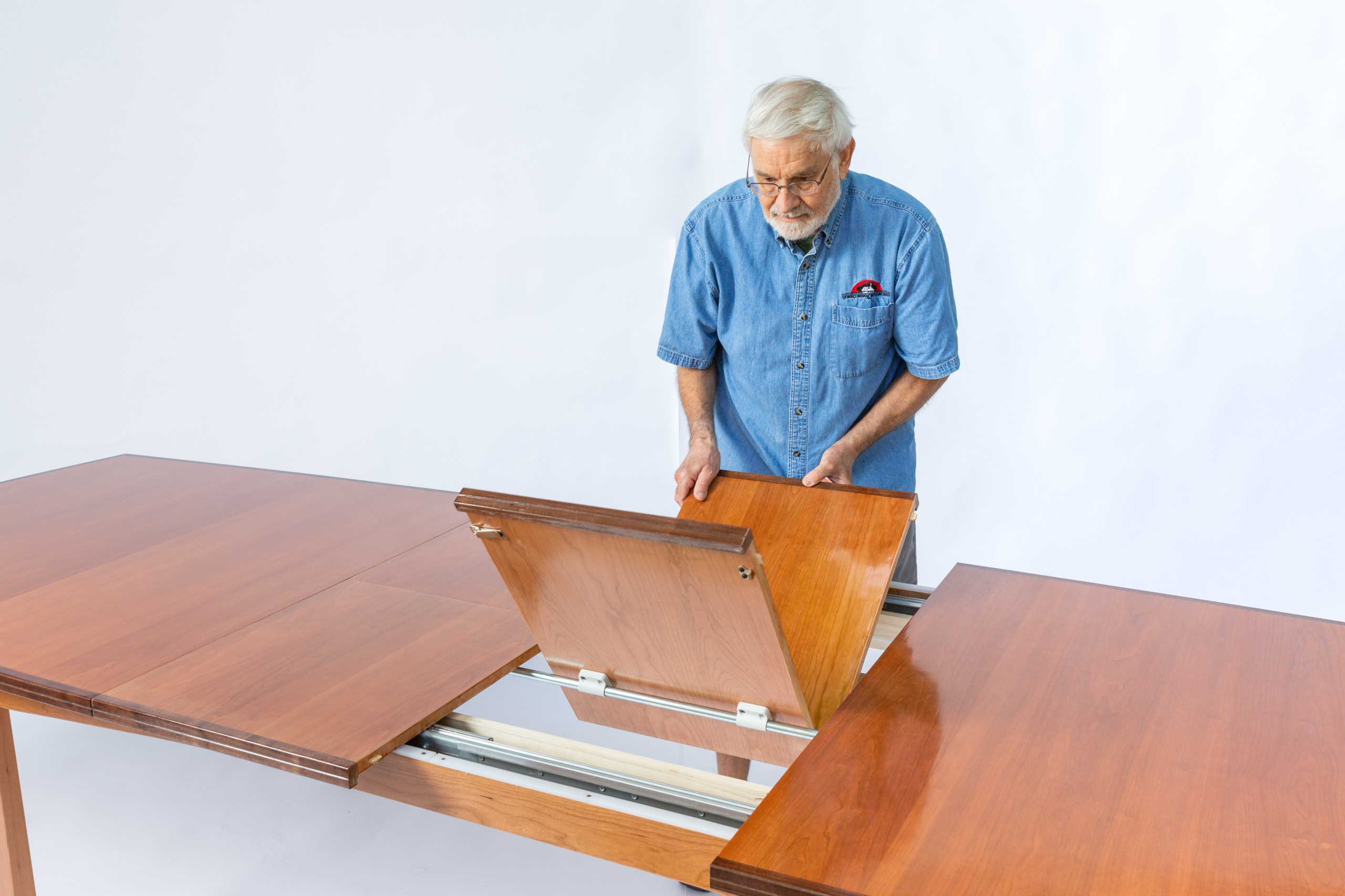Spitler Dining Table- in Cherry and Black Walnut