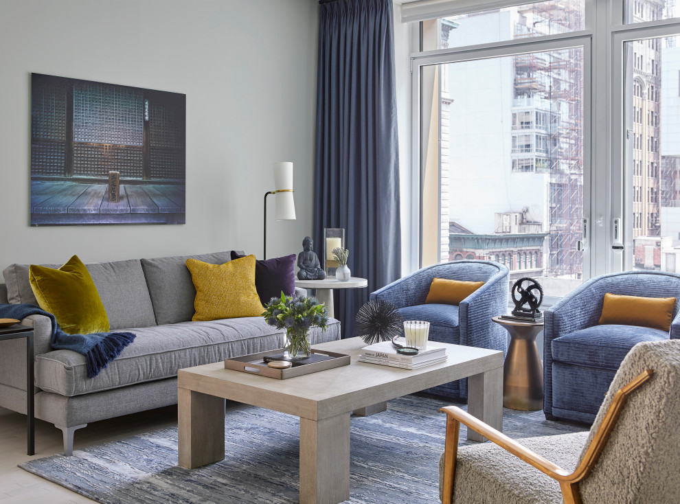 Living room - mid-sized contemporary light wood floor living room idea in New York with beige walls, no fireplace and no tv