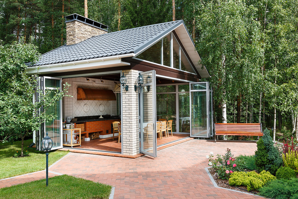Inspiration for a traditional patio in Saint Petersburg with an outdoor kitchen.