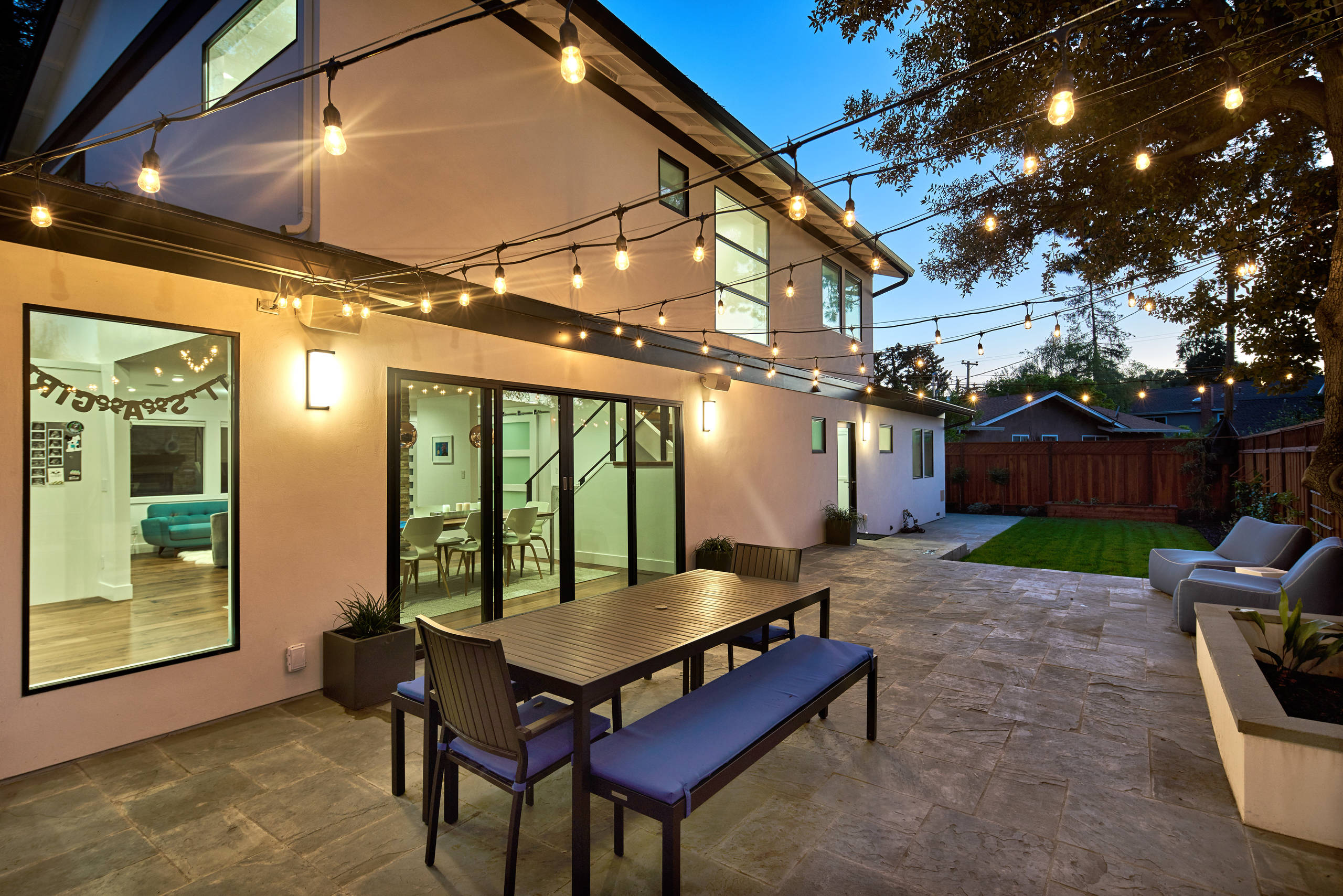 Backyard patio of a California home at dusk