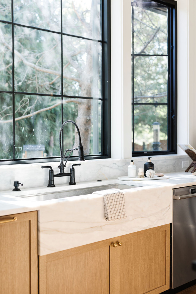 Example of a transitional kitchen design in Seattle
