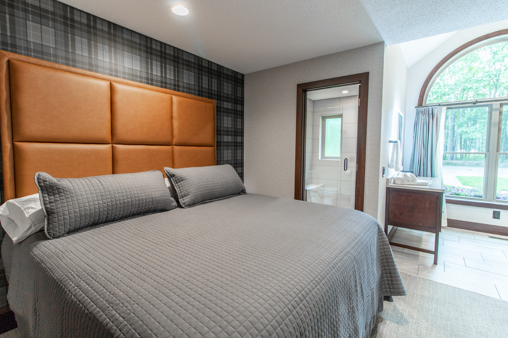 Inspiration for a mid-sized transitional master carpeted and gray floor bedroom remodel with gray walls