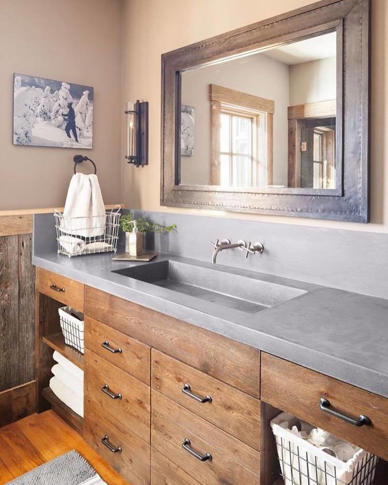 Inspiration for a mid-sized craftsman medium tone wood floor bathroom remodel in Orlando with furniture-like cabinets, medium tone wood cabinets, beige walls, an integrated sink and concrete countertops
