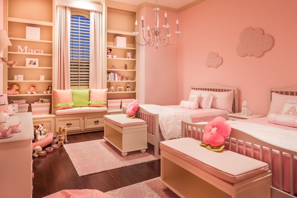 Photo of a large transitional bedroom in Houston with pink walls and dark hardwood floors.