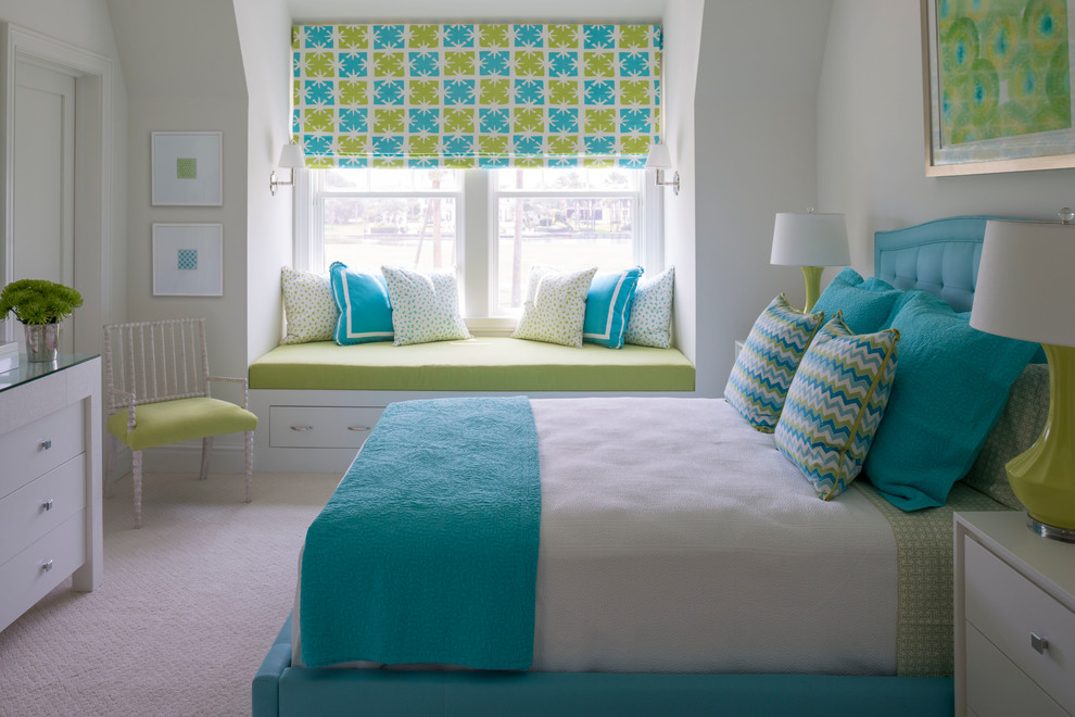 This is an example of a large beach style guest bedroom in Jacksonville with white walls.