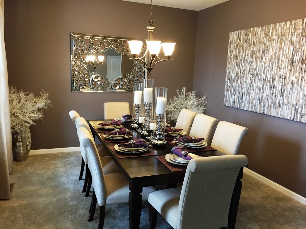 This is an example of a large contemporary separate dining room in Indianapolis with grey walls and carpet.