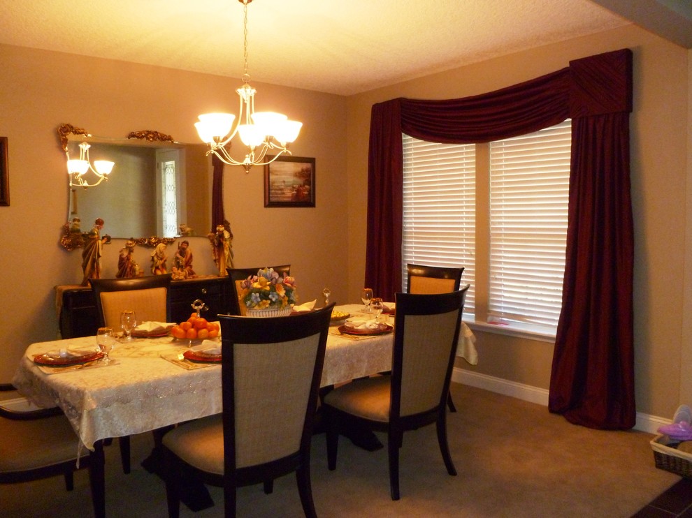 This is an example of a mid-sized traditional separate dining room in Jacksonville with beige walls and no fireplace.