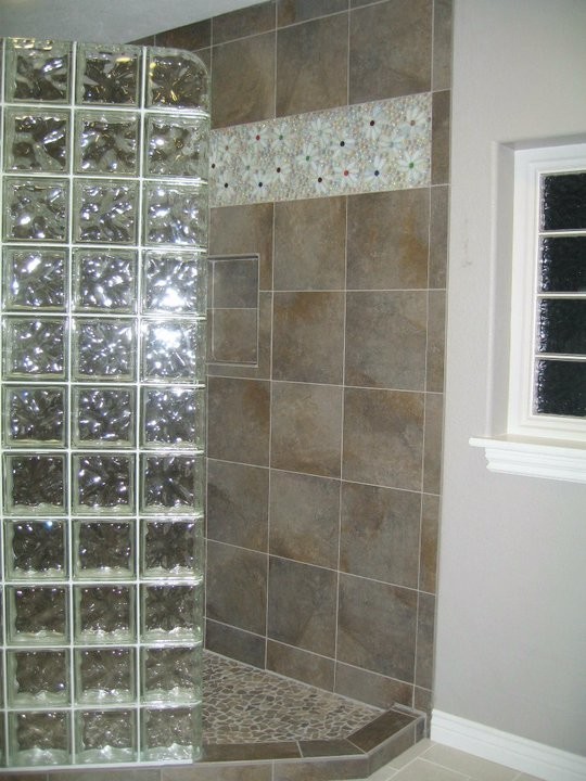 Inspiration for a mid-sized contemporary master bathroom in New York with multi-coloured tile and glass tile.